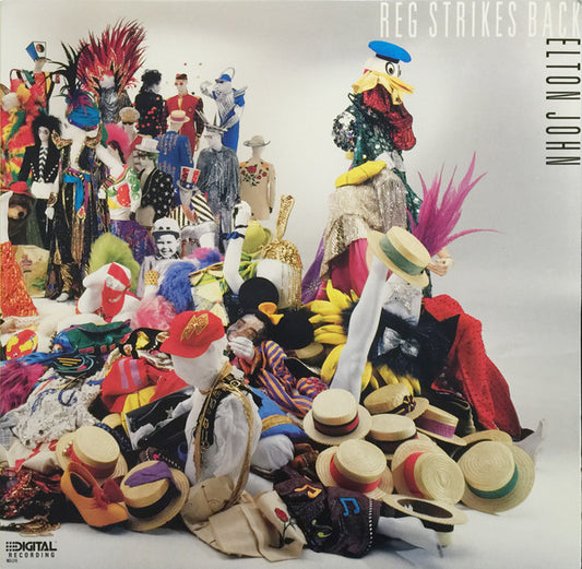 ELTON JOHN - Reg Strikes Back